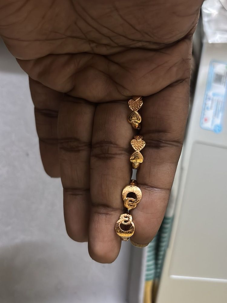Elegant Gold Bracelet with Heart Charms