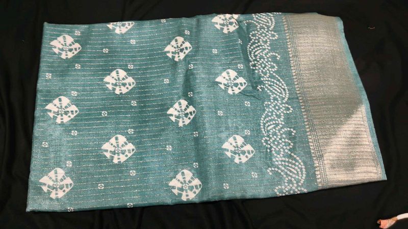 Beautiful Teal Saree with White Motifs