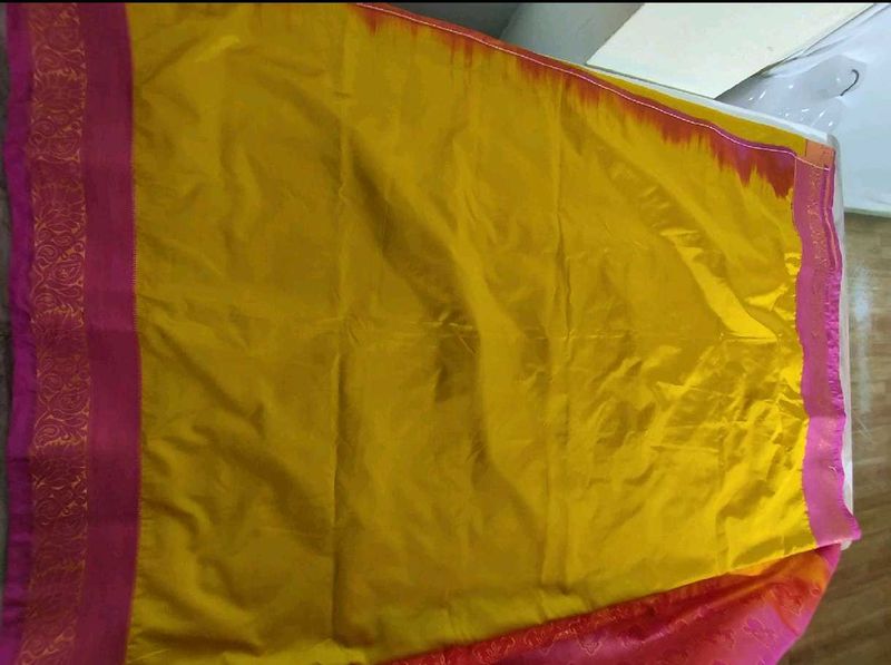 Vibrant Yellow Saree with Pink Border