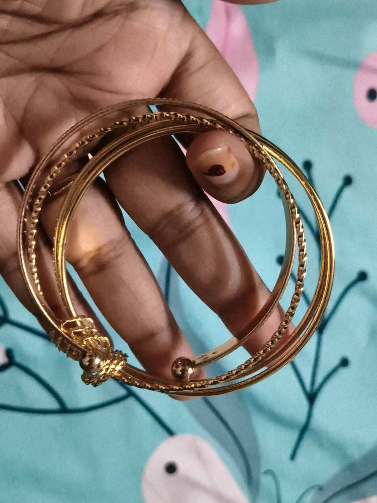Elegant Gold Tone Bangle Set