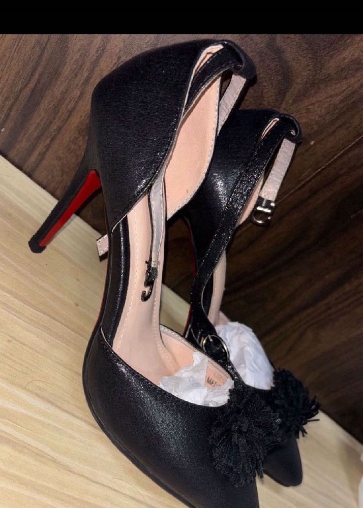 Stylish Black Heels with Pom-Pom Accent