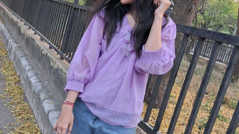 women dark levender color top with dobby print