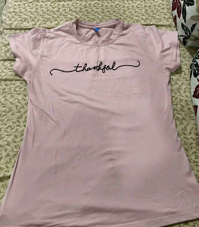 a pink top