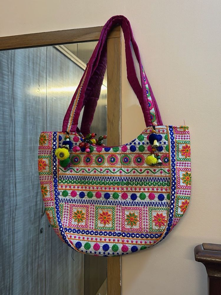 Embroidered Hobo Bag with Tassels