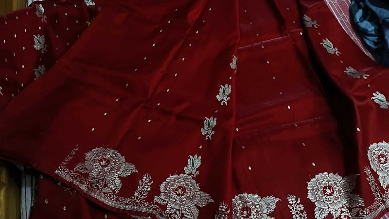 Exquisite Red Silk Saree with Floral Embroidery