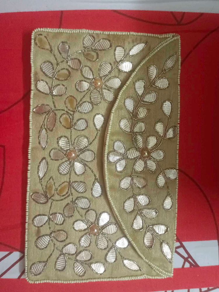 Gotta pati Clutch Bag