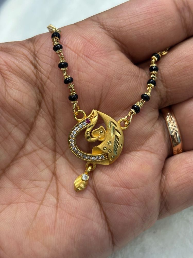 Elegant Gold Mangalsutra with Black Beads