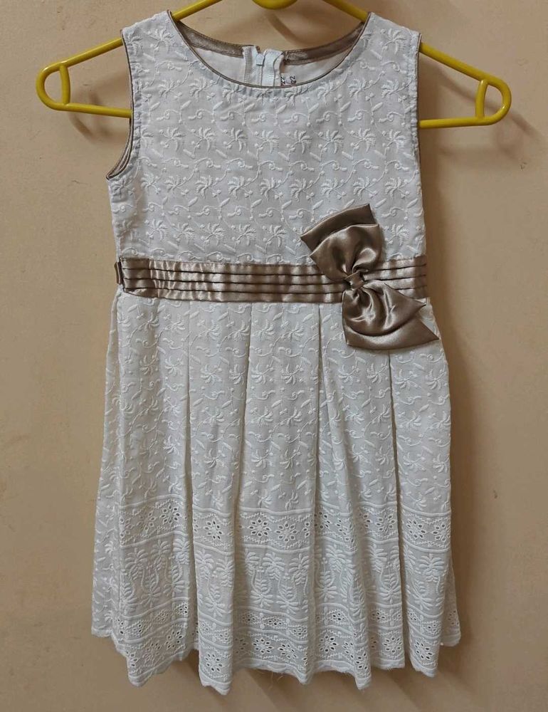 Chic White Lace Dress with Bow Detail
