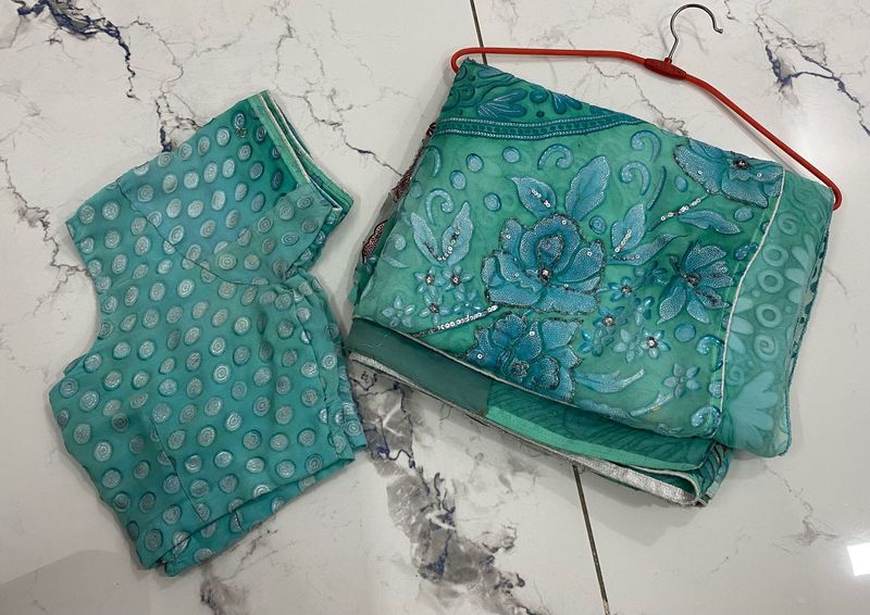 Beautiful Teal Embroidered saare with blouse