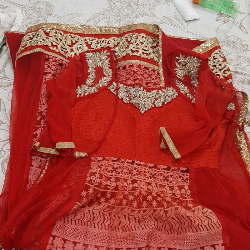 beautiful red long kurty  with golden Embroidered