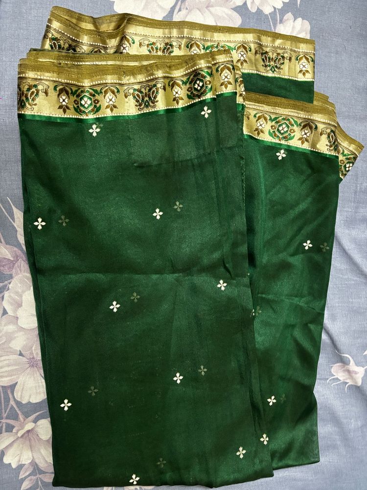 Elegant Green Saree with Gold Border