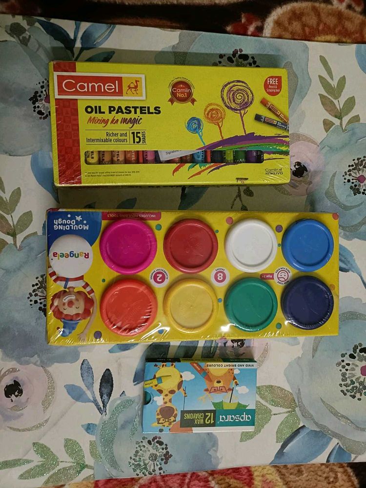 Two Art Supplies With A Box Of Clay.