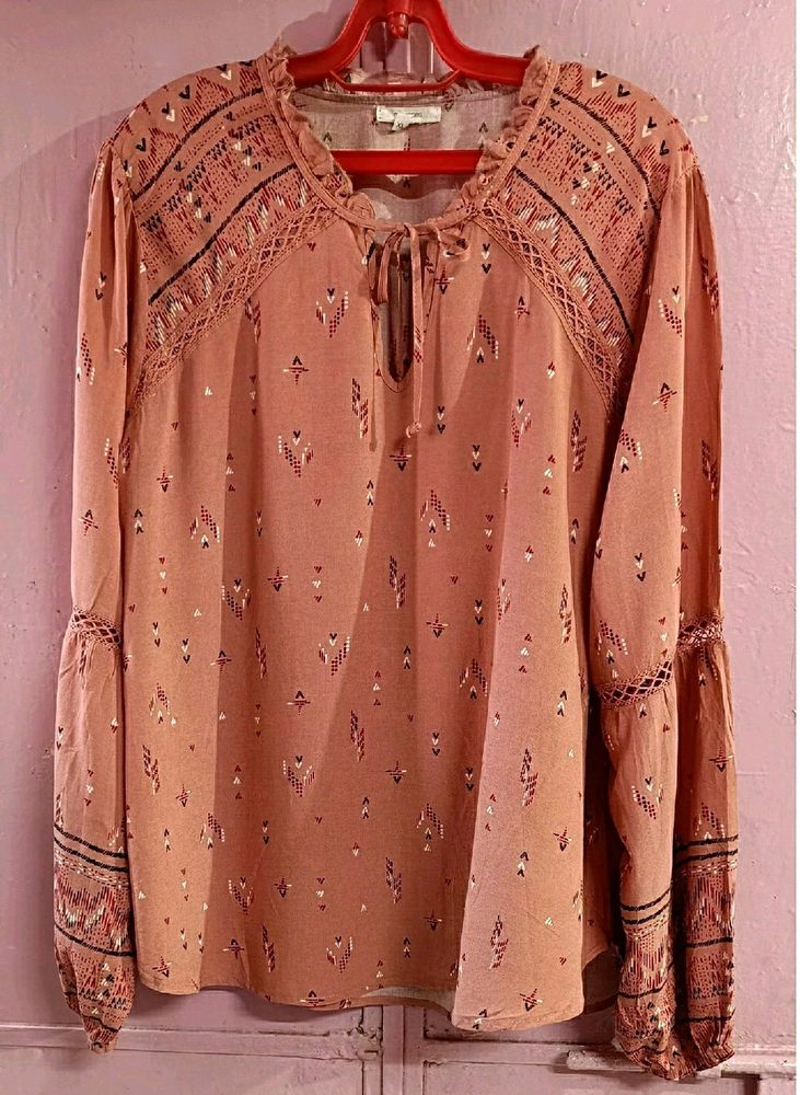 Branded Top With Pretty Colour N Beautiful Sleeves... Suitable For Summer